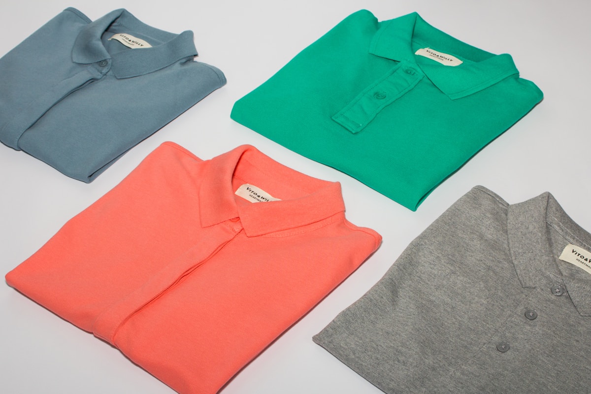 Folded polo shirts in neutral colors